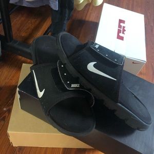 Black and white Nike Slides